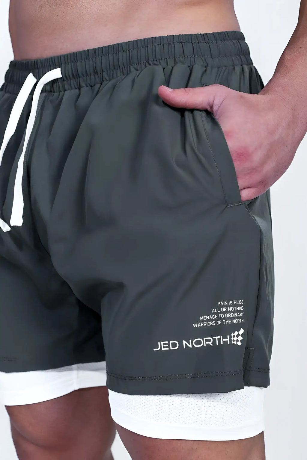 Jed North men’s 2-in-1 olive athletic shorts with white drawstrings, inner lining, and logo on lower leg