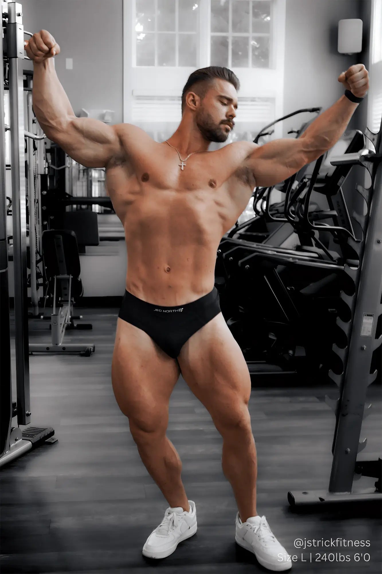 Black jed north seamless athletic briefs with subtle white logo on waistband designed for men performance wear