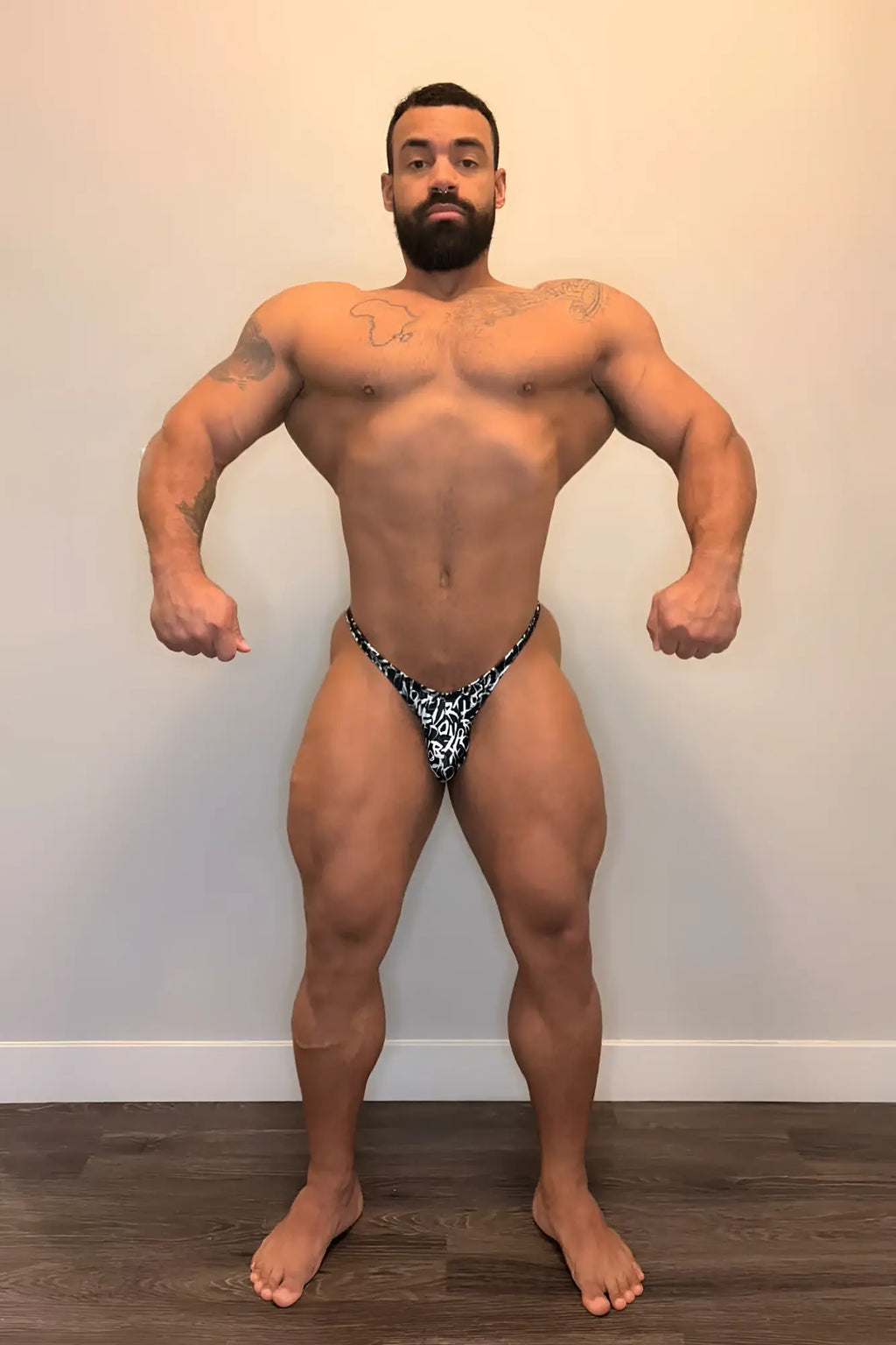 Men’s bodybuilding posing trunks chaotic with black and white bold graphic patterned briefs front view