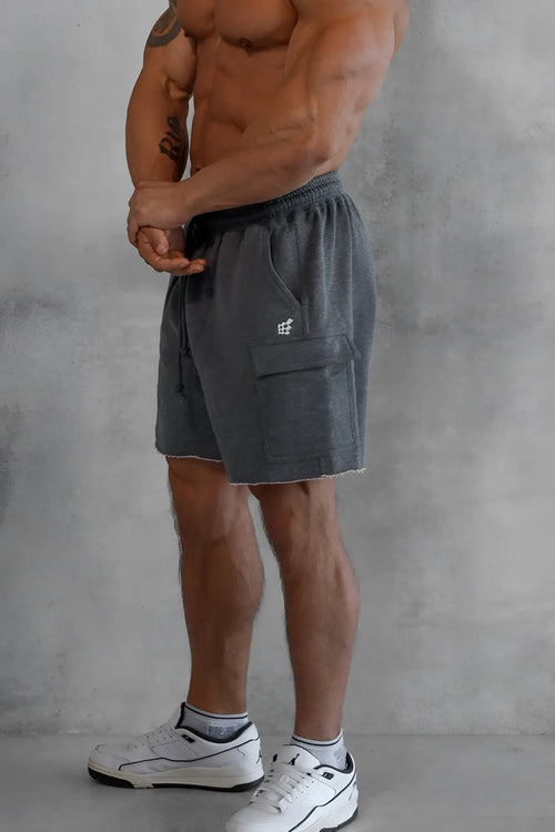 Men’s dark gray cargo sweat shorts with textured fabric and a small white logo on the thigh pocket