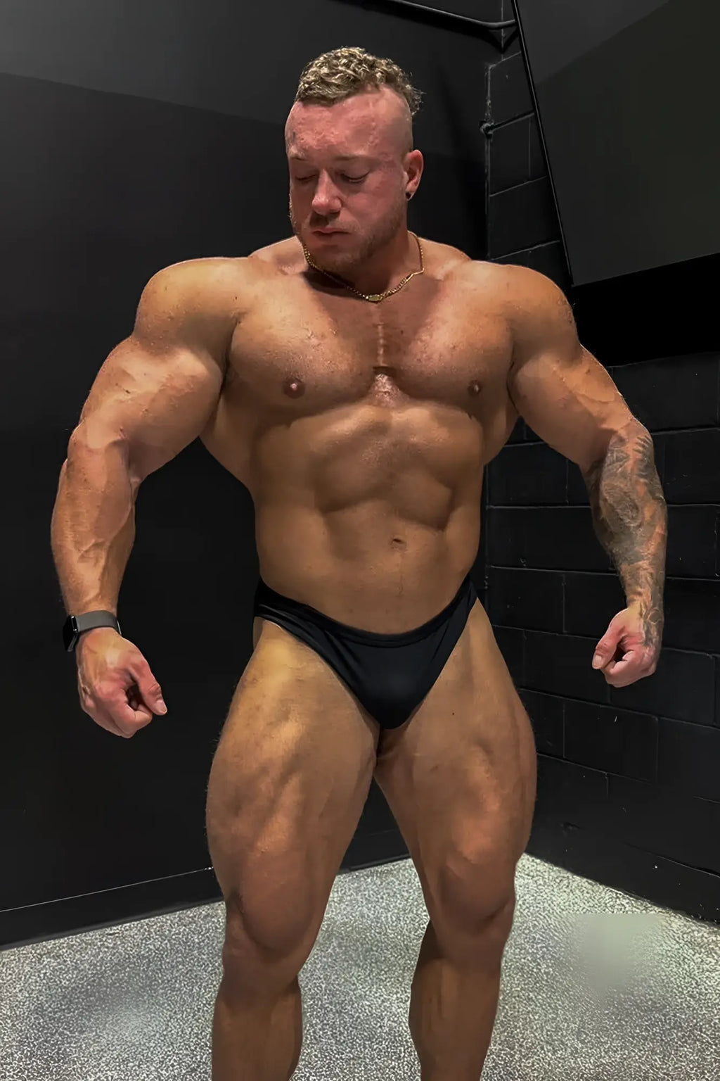 Men’s classic physique trunks 2 inch seam black athletic briefs with snug fit and smooth fabric front view