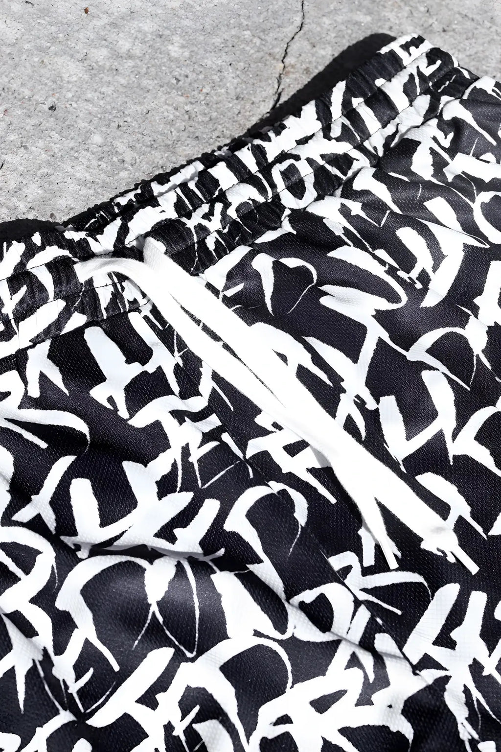 Jed north men’s fast-dry 5 inch training shorts with black and white abstract graffiti print and drawstring waistband