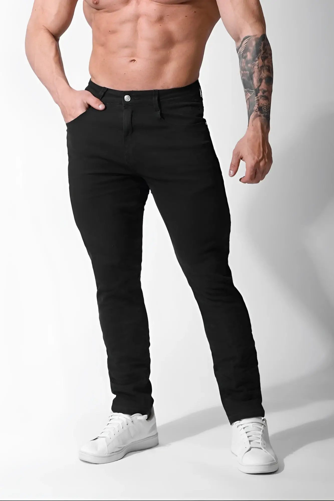 Men’s fitted stretchy black slim-fit denim jeans with classic five-pocket design and silver button closure