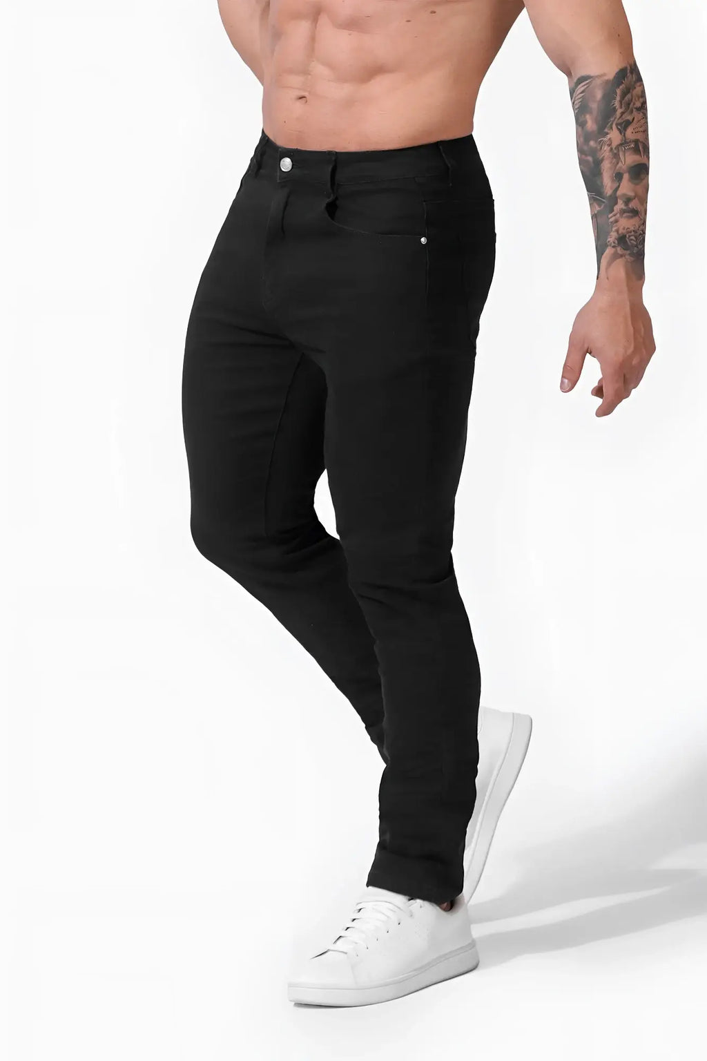 Men’s fitted stretchy black denim jeans with a slim fit modern cut and subtle stitching details