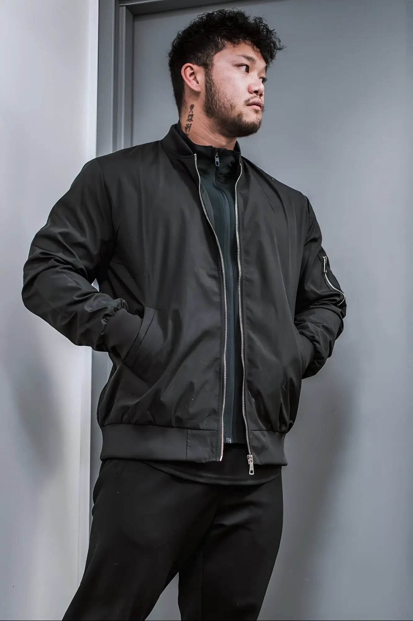 Men’s premium bomber jacket black with a matte finish and silver zipper accents for a sleek casual look