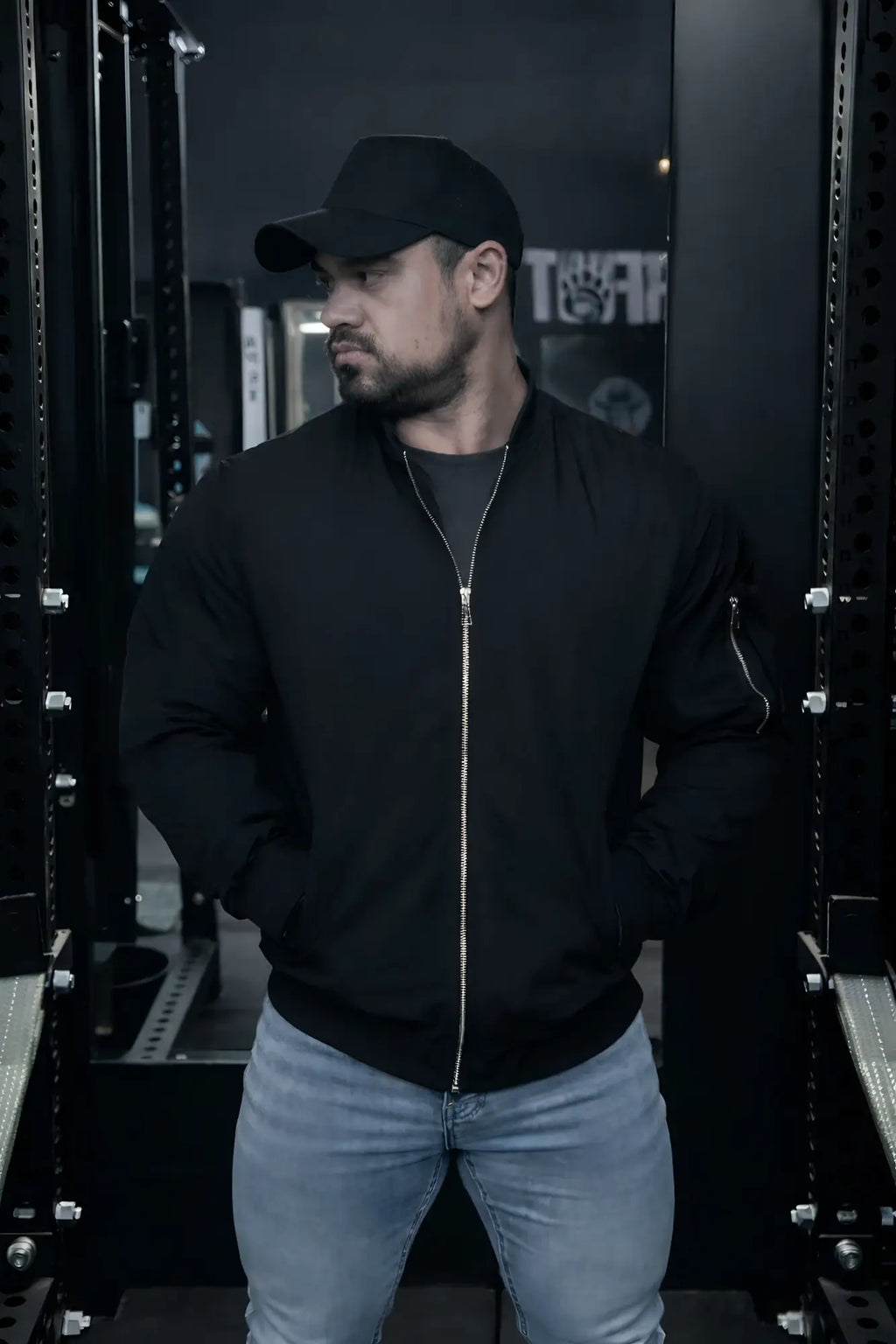 Men’s premium black bomber jacket with silver zipper and sleeve detail in durable material for stylish outerwear