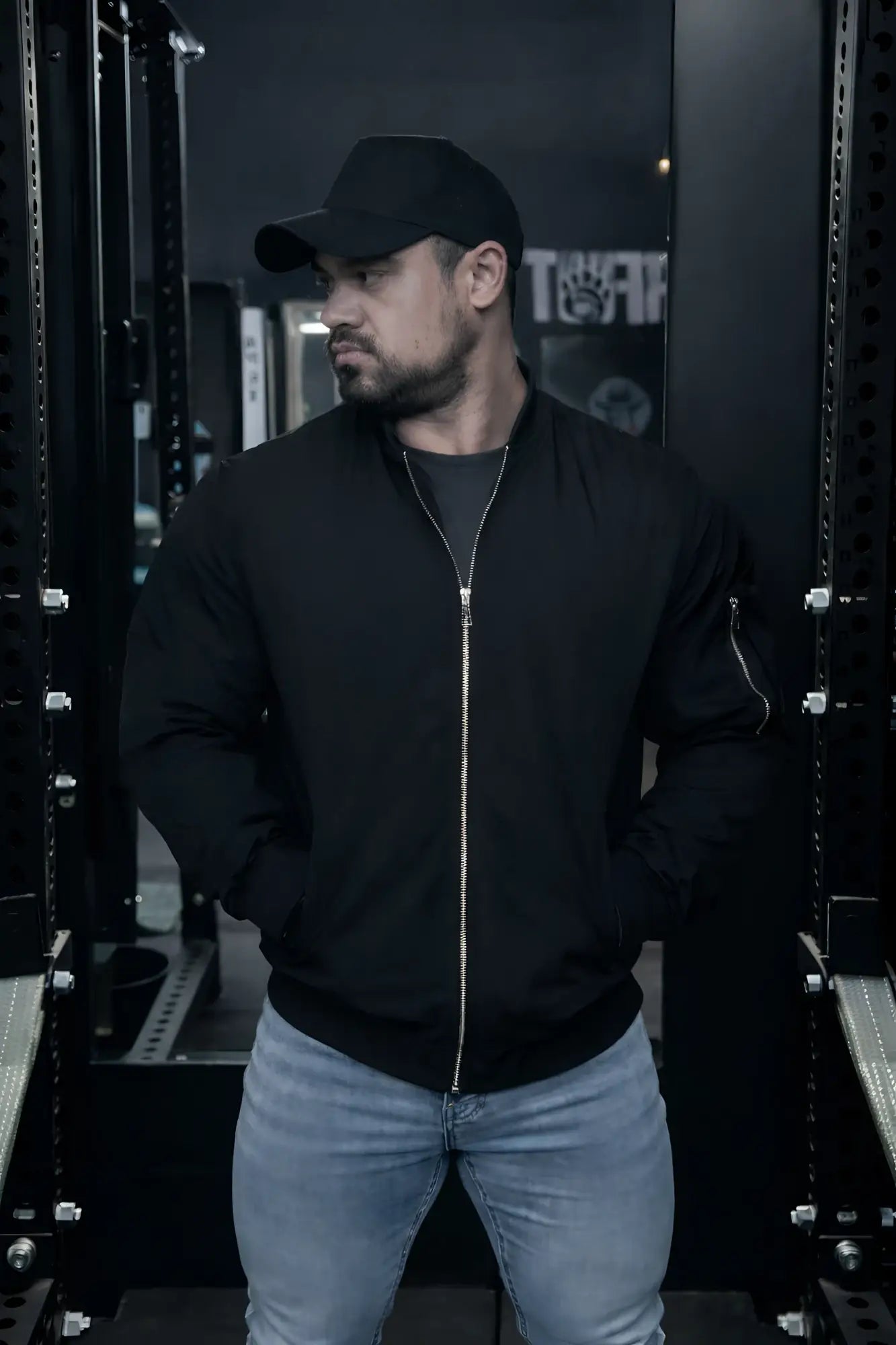 Men’s premium black bomber jacket with silver zipper and sleeve detail in durable material for stylish outerwear