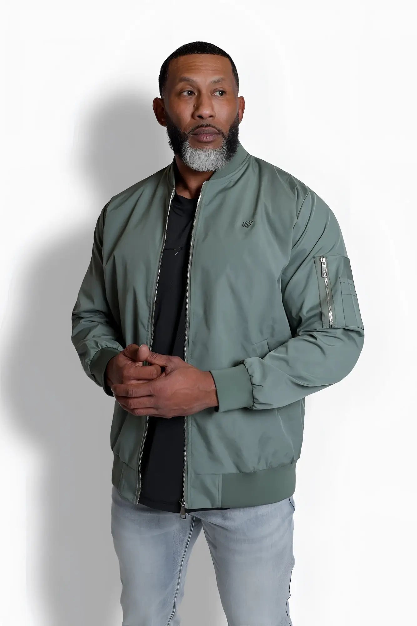 Men’s premium olive bomber jacket with zippered pockets and subtle brand logo on the chest in durable fabric