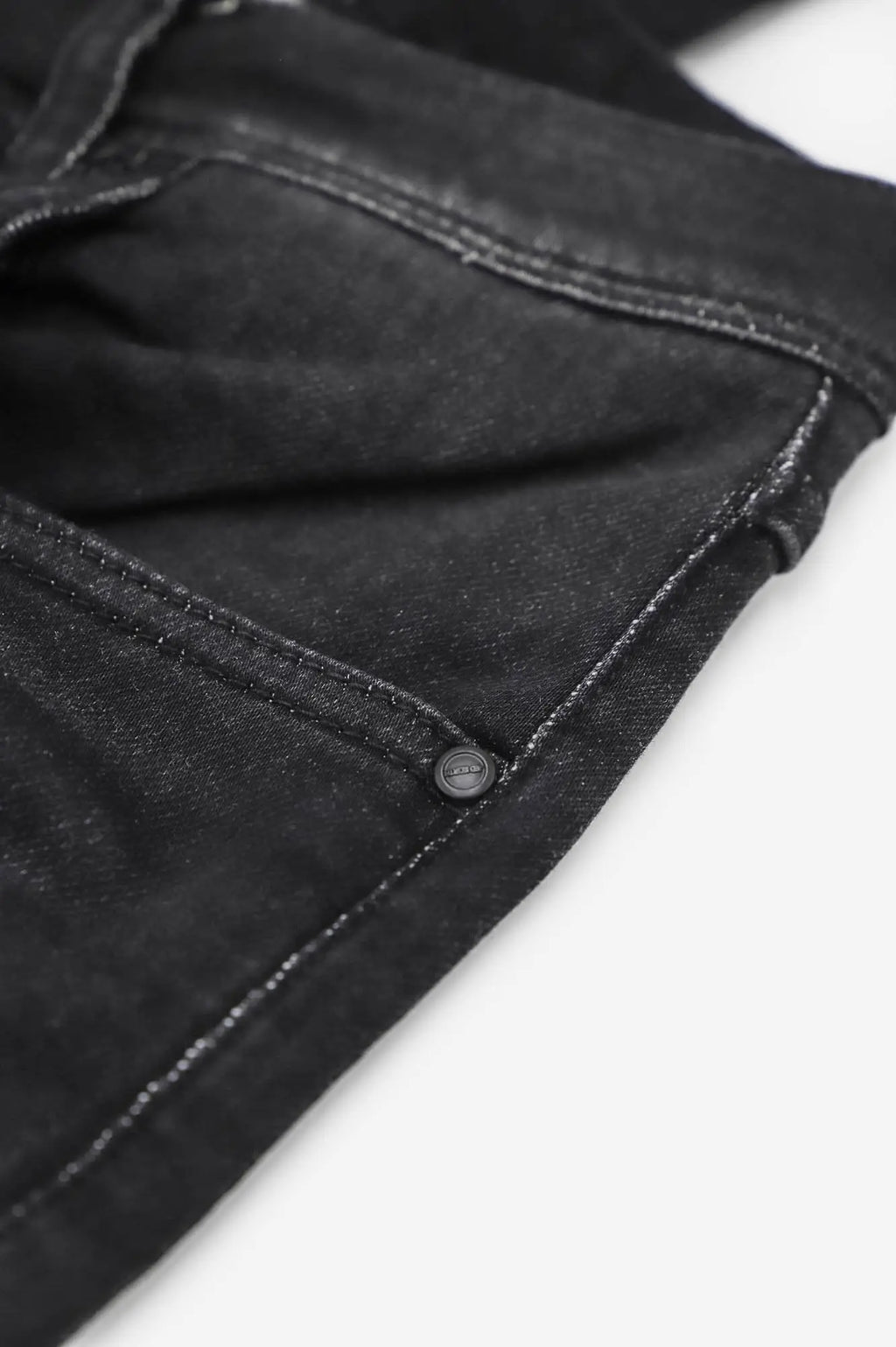 Men’s premium fitted stretchy jeans in faded black denim with subtle texture and reinforced stitching