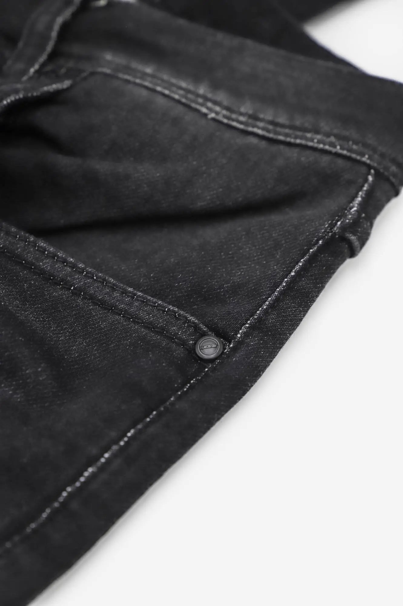 Men’s premium fitted stretchy jeans in faded black denim with subtle texture and reinforced stitching