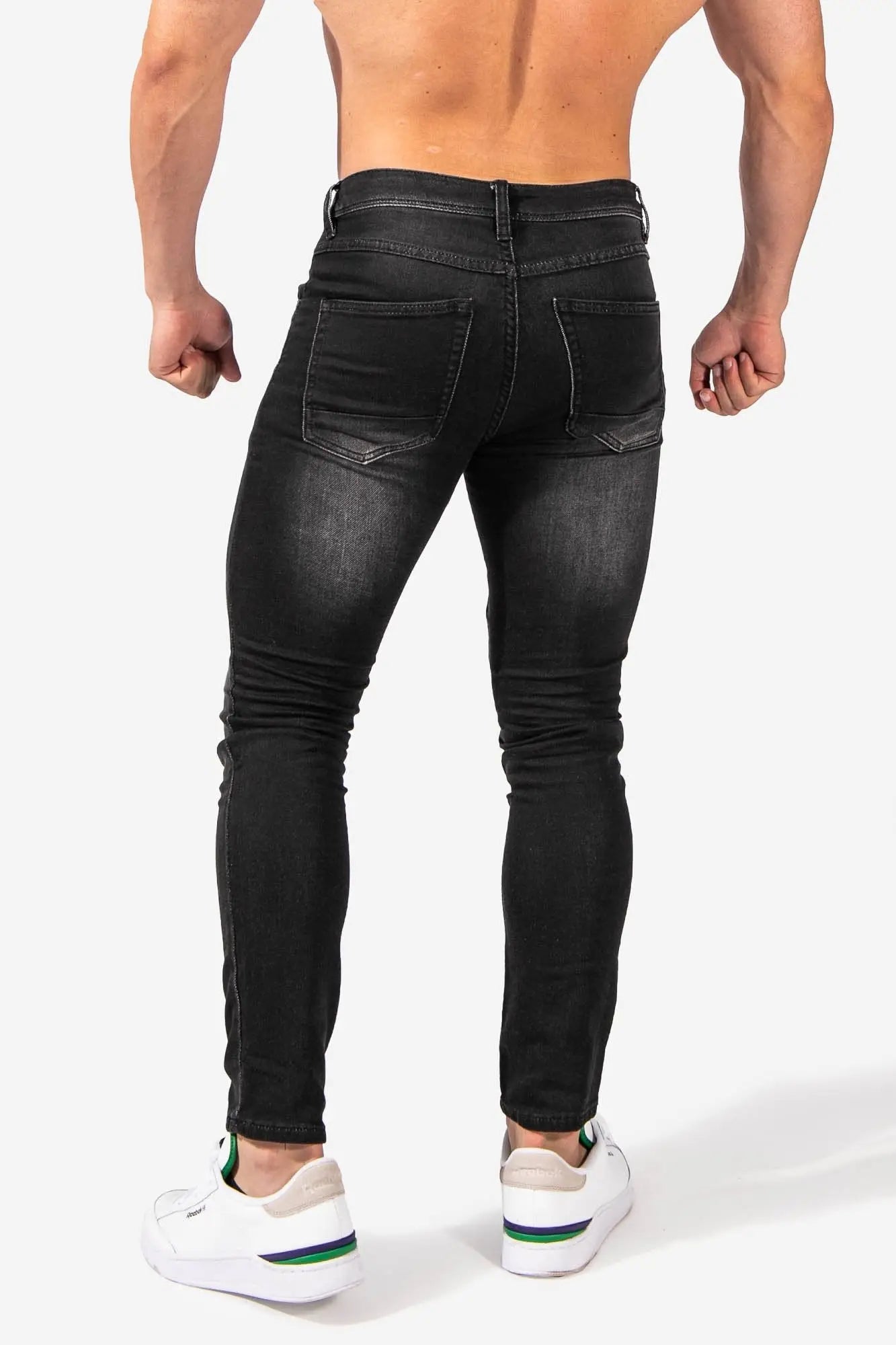 Men’s premium fitted stretchy black skinny-fit denim jeans with subtle fading and reinforced stitching