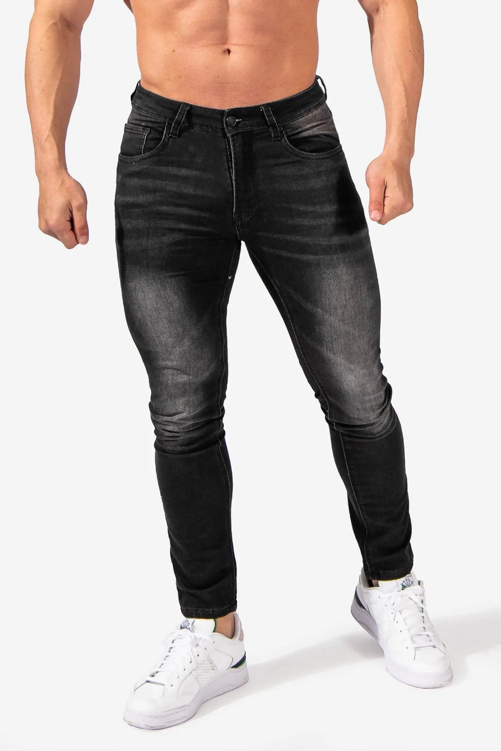 Men’s premium fitted stretchy black slim-fit jeans with a faded distressed design and subtle texture