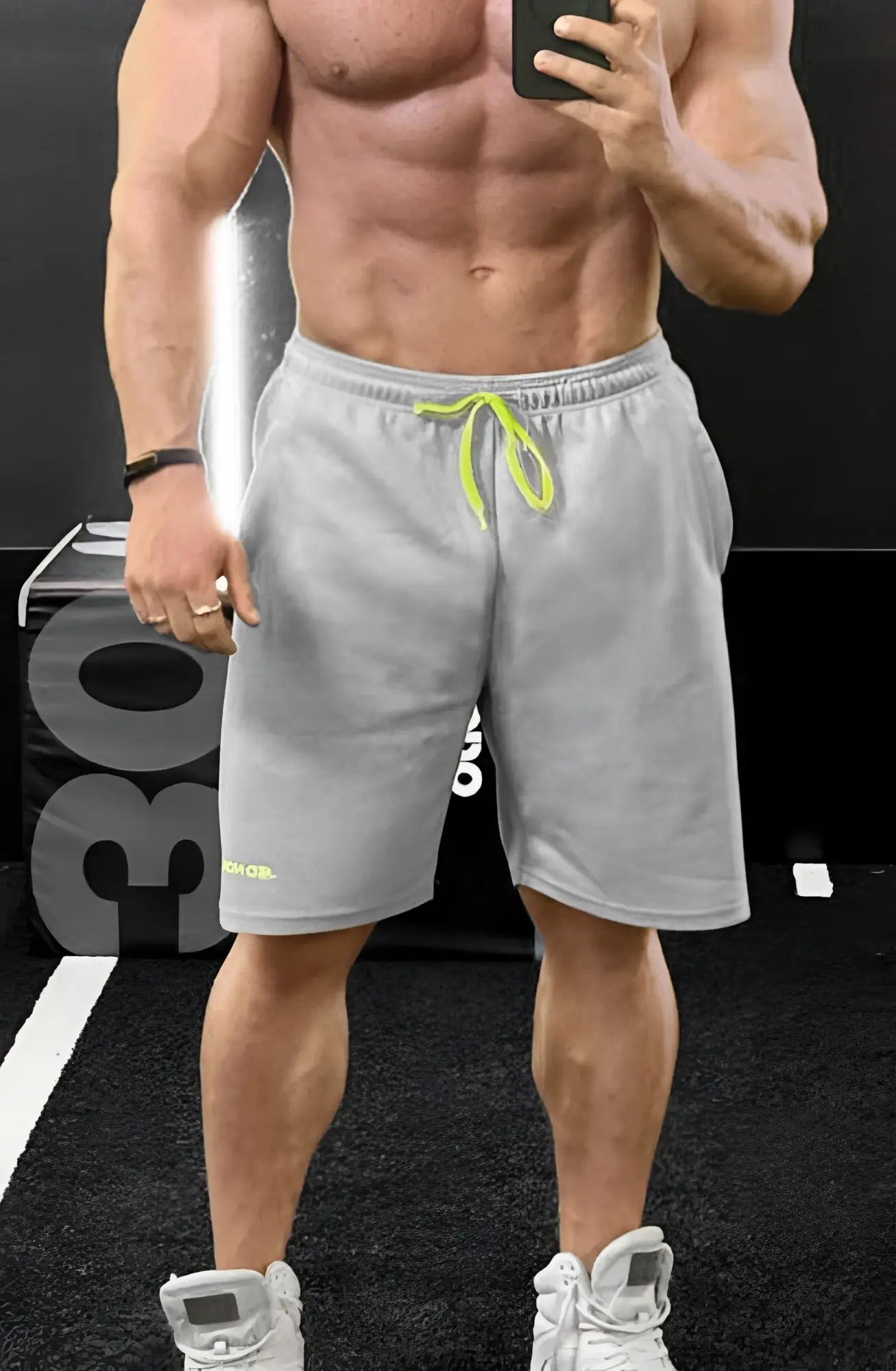 Men’s pro mesh shorts 8 light gray with neon green drawstring and subtle side branding in breathable fabric