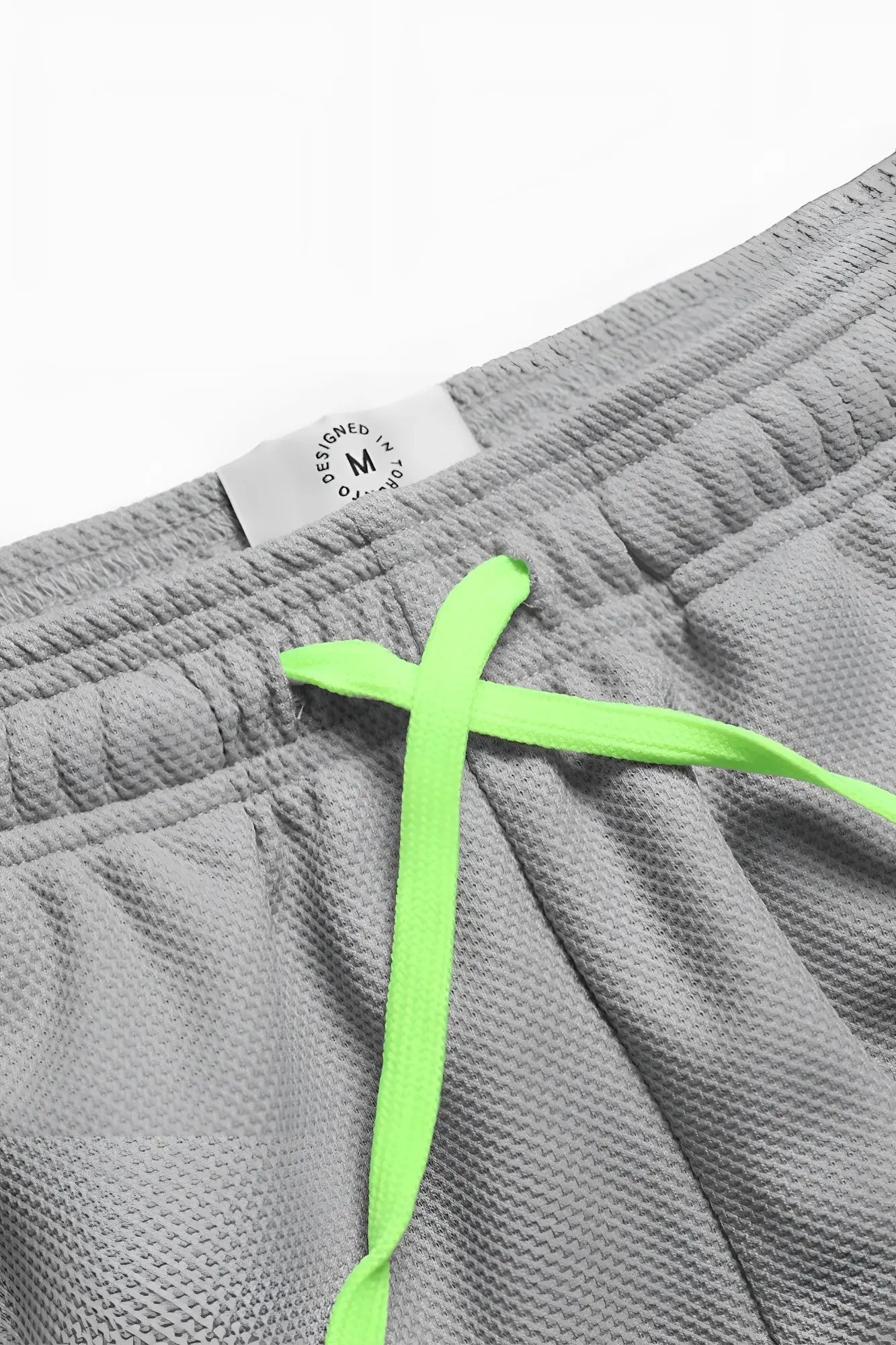 Men’s pro mesh shorts 8 light gray textured athletic shorts with neon green drawstrings for activewear use