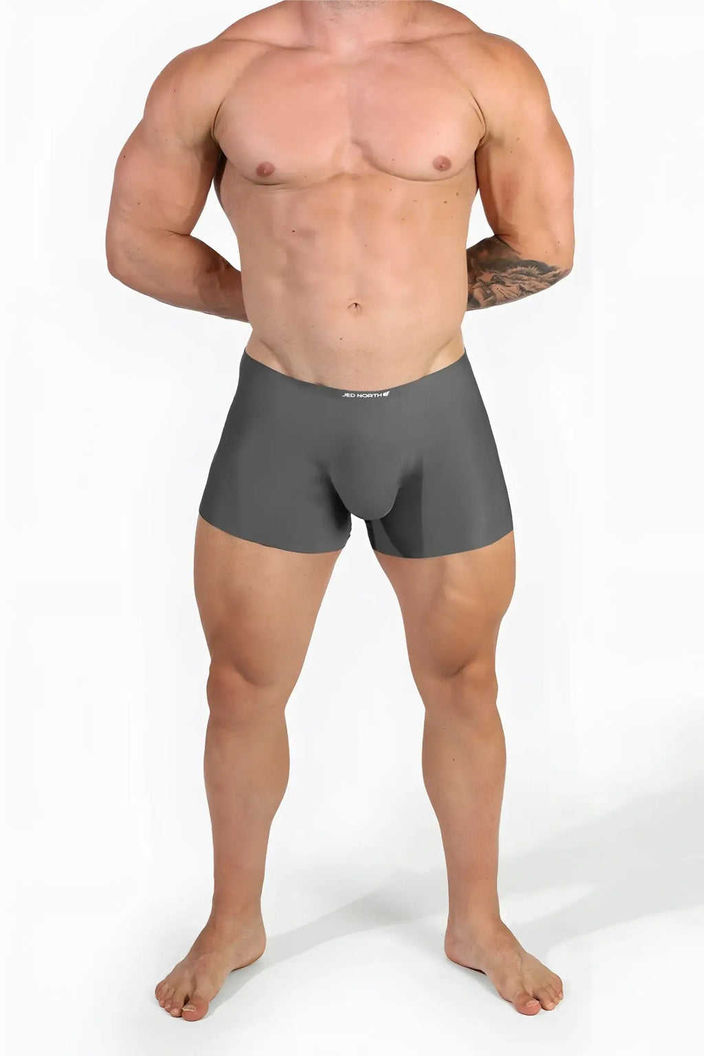 Gray jed north seamless muscle fit athletic briefs in smooth form fitting fabric with subtle waistband logo