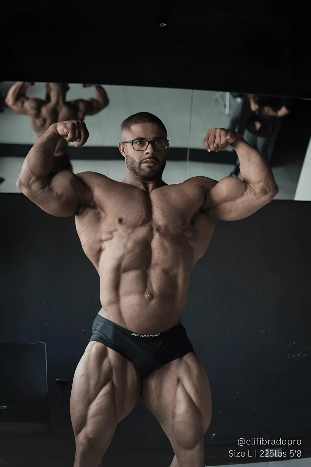 Black jed north seamless muscle fit athletic briefs with subtle white logo on waistband front view