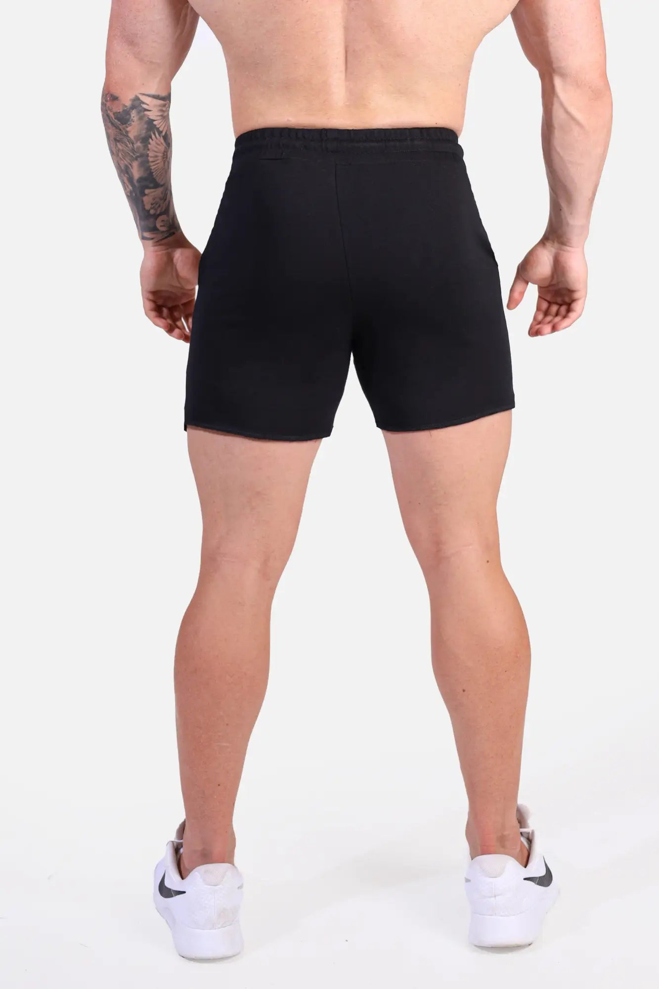 Jed North motion 5 inch varsity black athletic shorts with sleek form fitting design and subtle side pockets