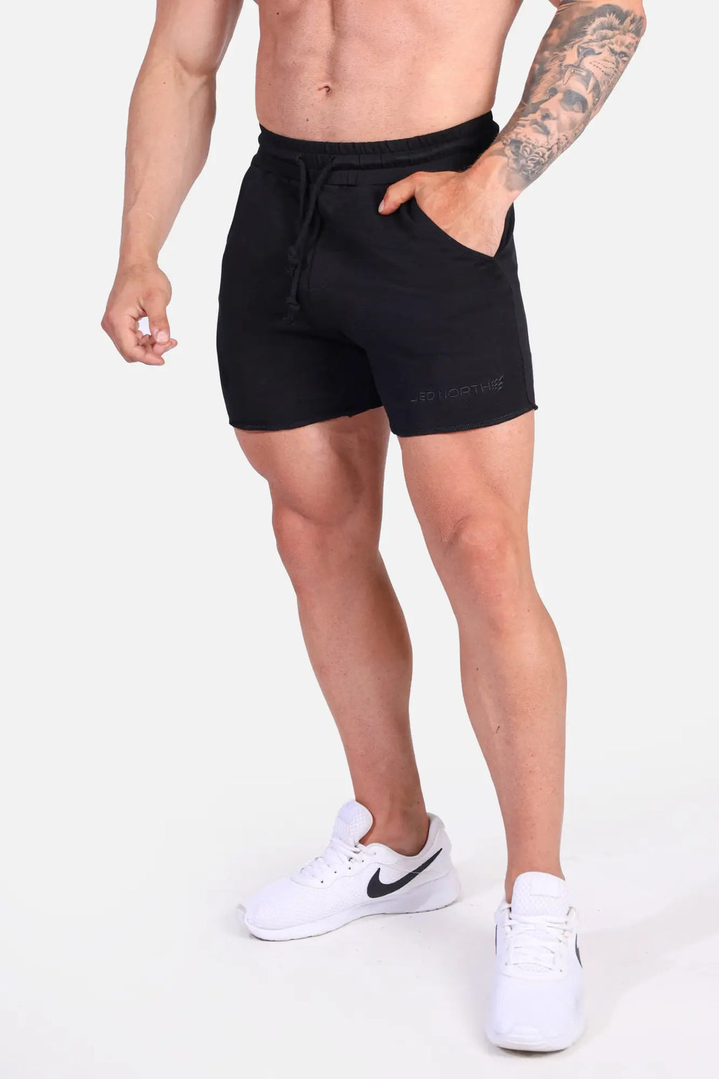 Jed North motion 5-inch varsity sweat shorts in black with drawstring waist and subtle logo on lower right leg