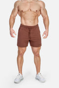Jed North motion 5 inch varsity sweat shorts in dark brown with a drawstring waistband and subtle side stripes