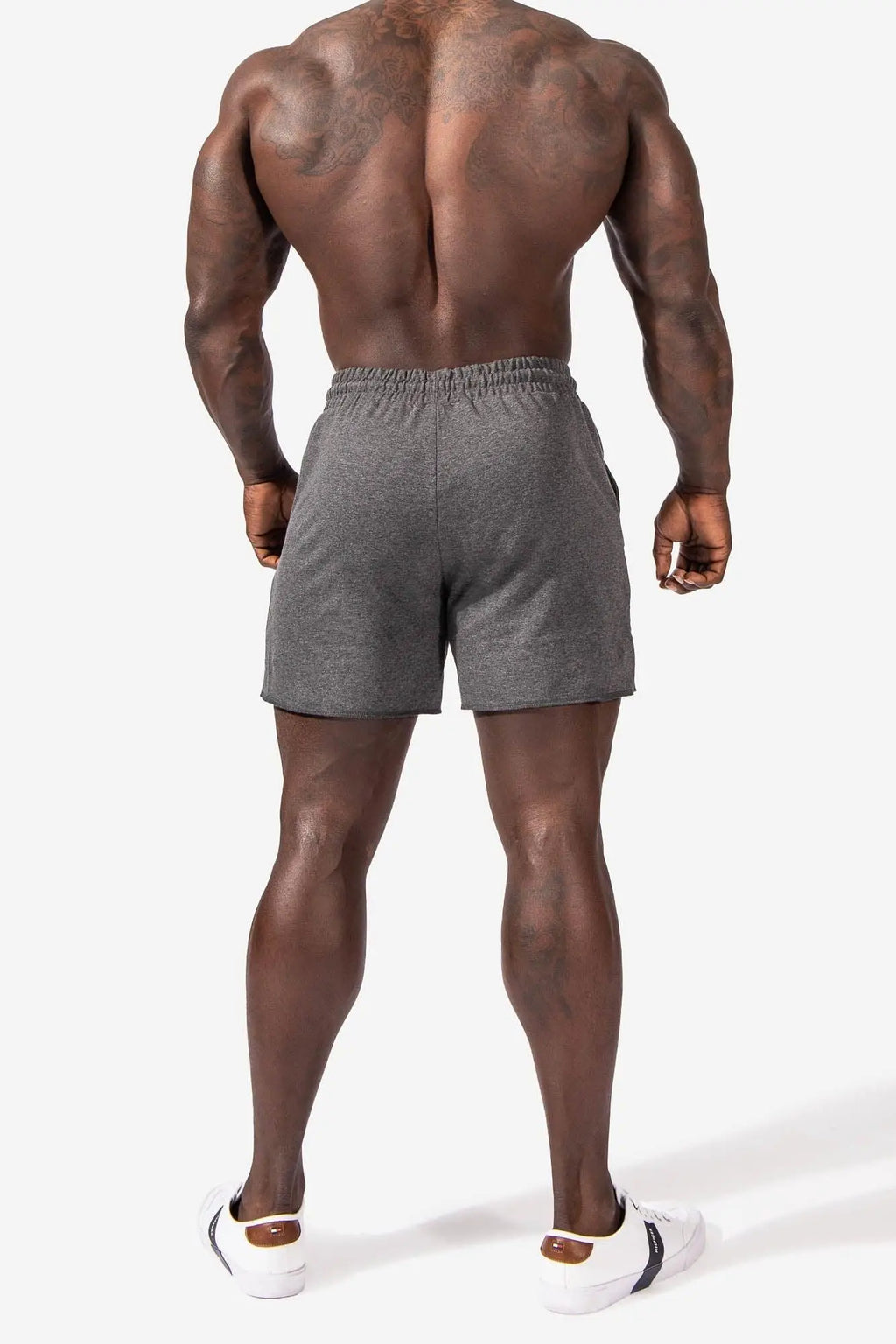 Motion 5 inch varsity sweat shorts in dark gray heathered fabric with elastic waistband for athletic use