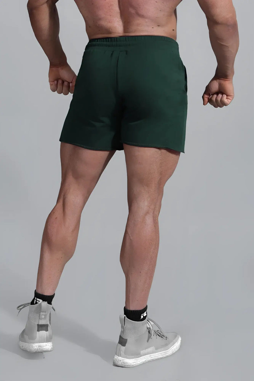 Dark green jed north motion 5 inch varsity sweat shorts with relaxed fit and elastic waistband for athletic use