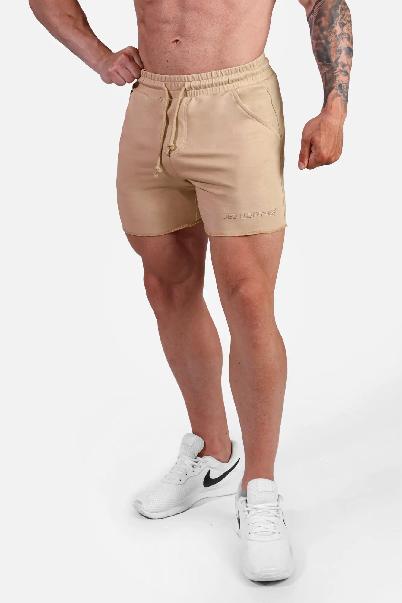 Beige khaki jed north motion 5 inch varsity sweat shorts with drawstring waistband and subtle side pockets
