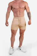 Jed North Motion 5 inch varsity sweat shorts in khaki with beige drawstring, relaxed fit, and subtle side pockets