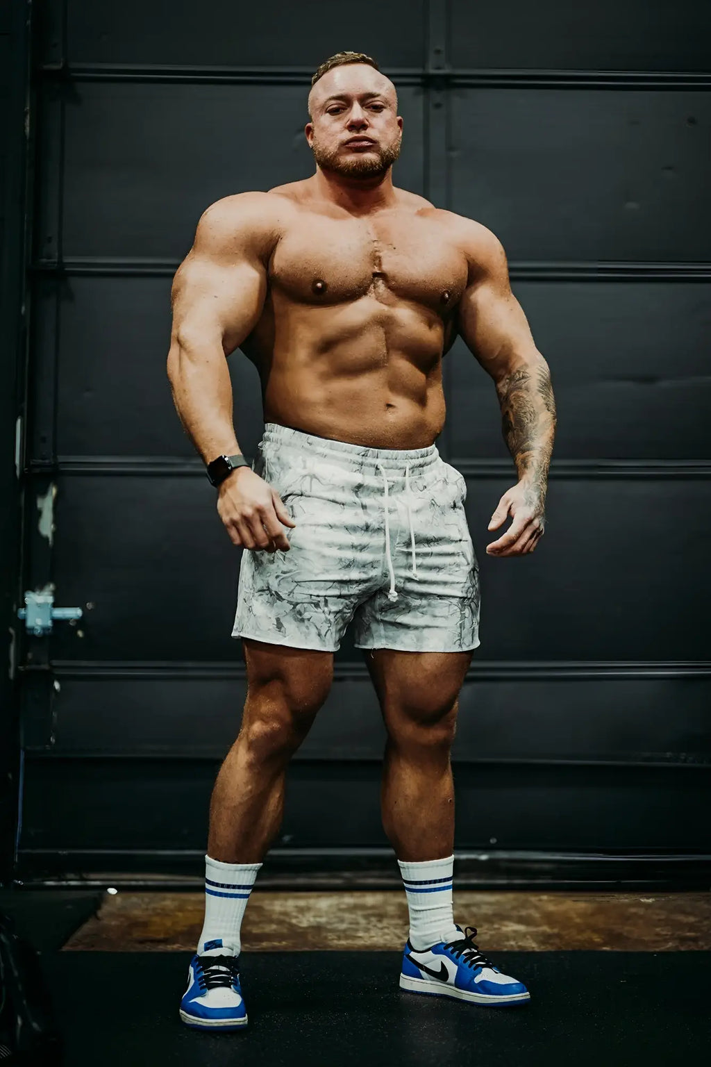 Motion 5 inch varsity sweat shorts in white and gray leaf camo pattern with drawstring waistband for athletic use
