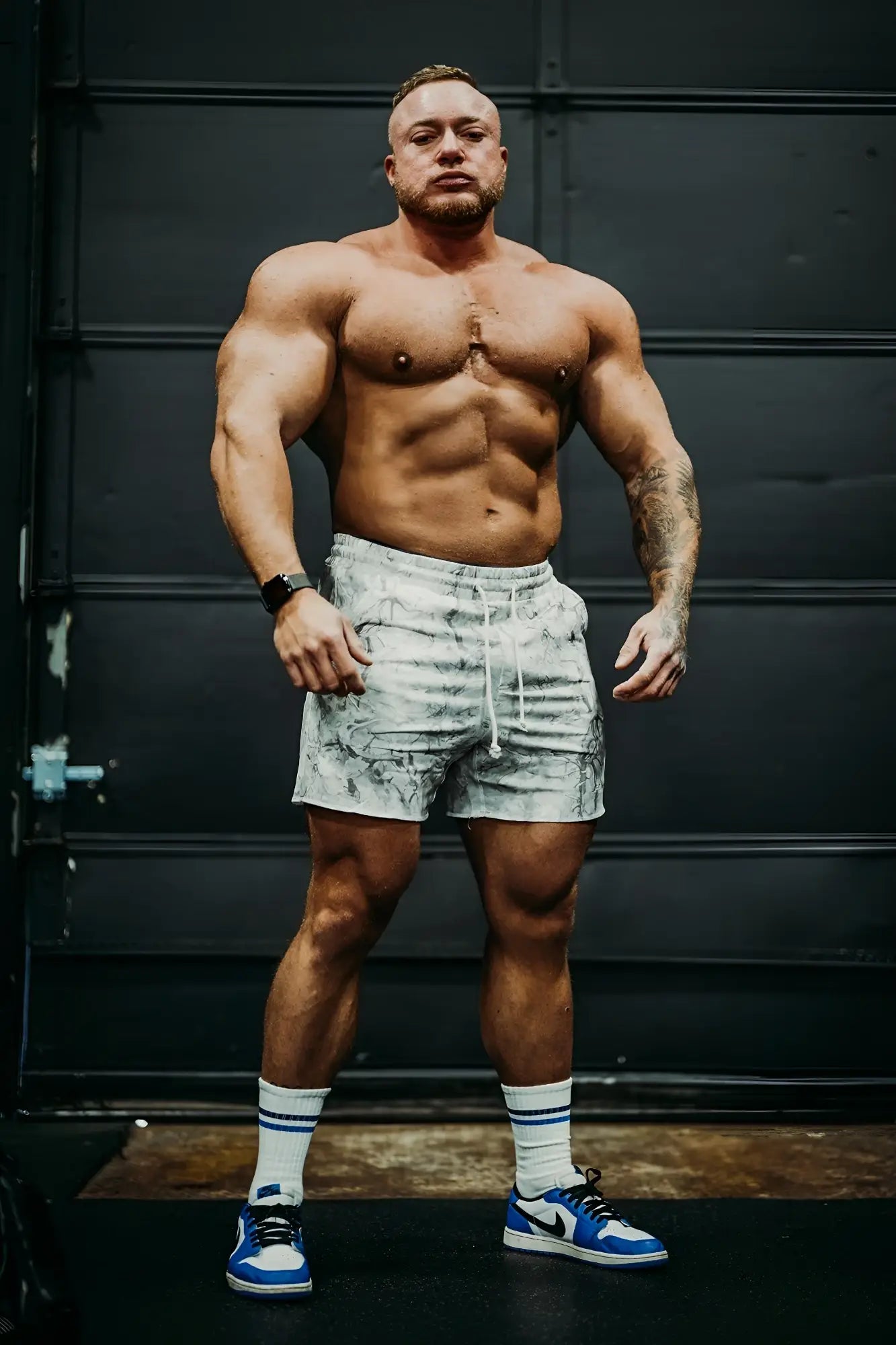 Motion 5 inch varsity sweat shorts in white and gray leaf camo pattern with drawstring waistband for athletic use