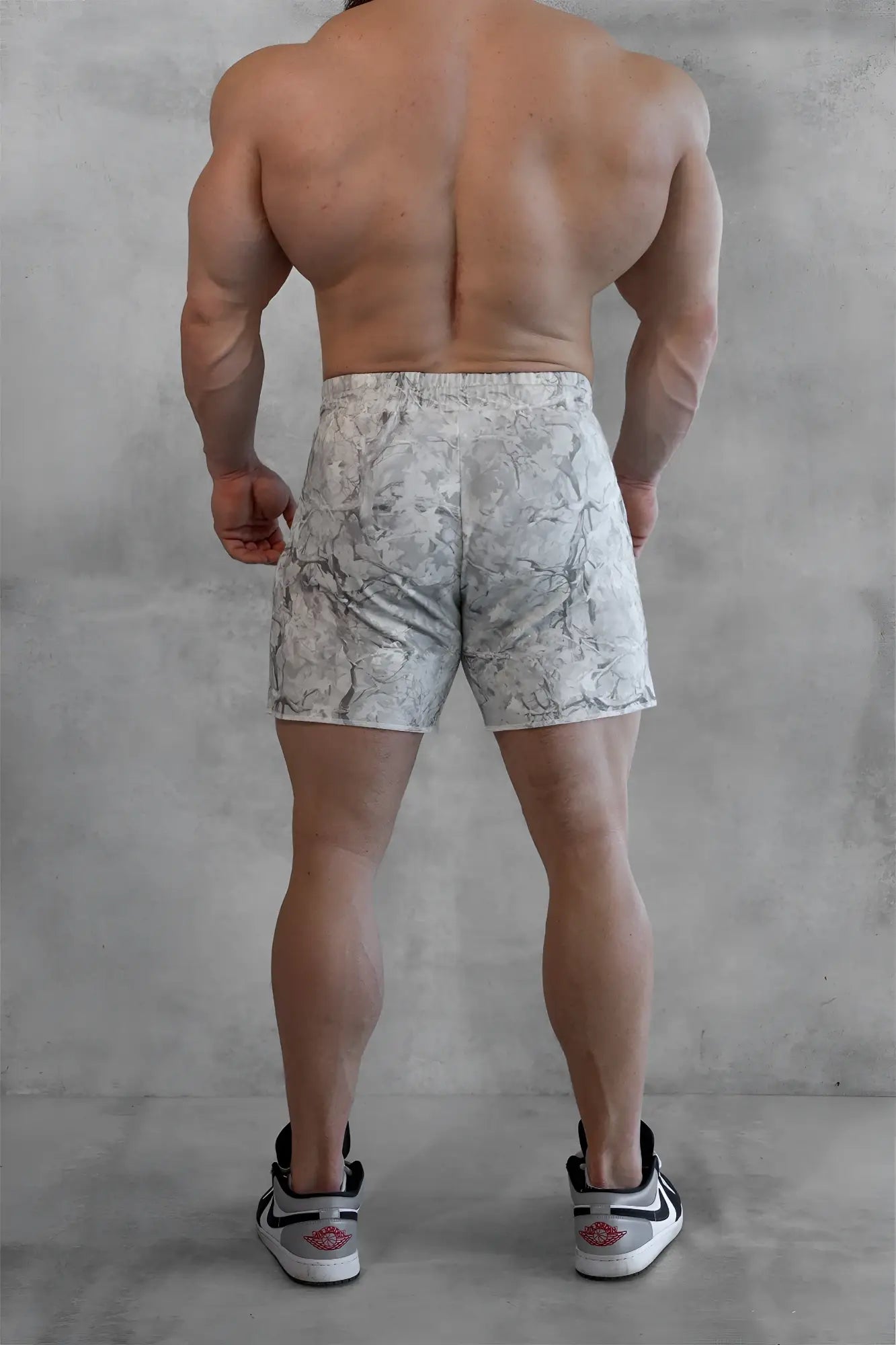 Motion 5 inch varsity sweat shorts in white and gray marble pattern designed for athletic use