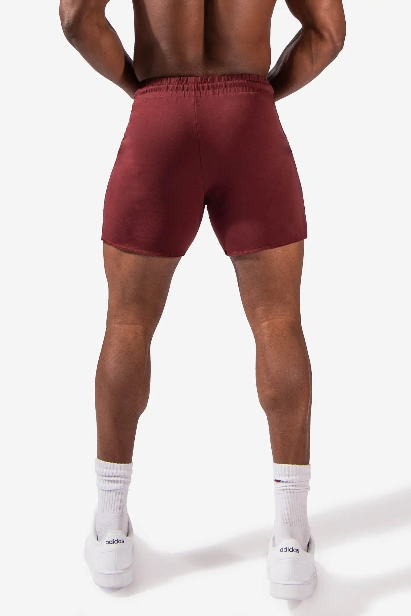 Maroon Jed North Motion 5 inch varsity sweat shorts with elastic waistband and sleek fitted design for athletic use