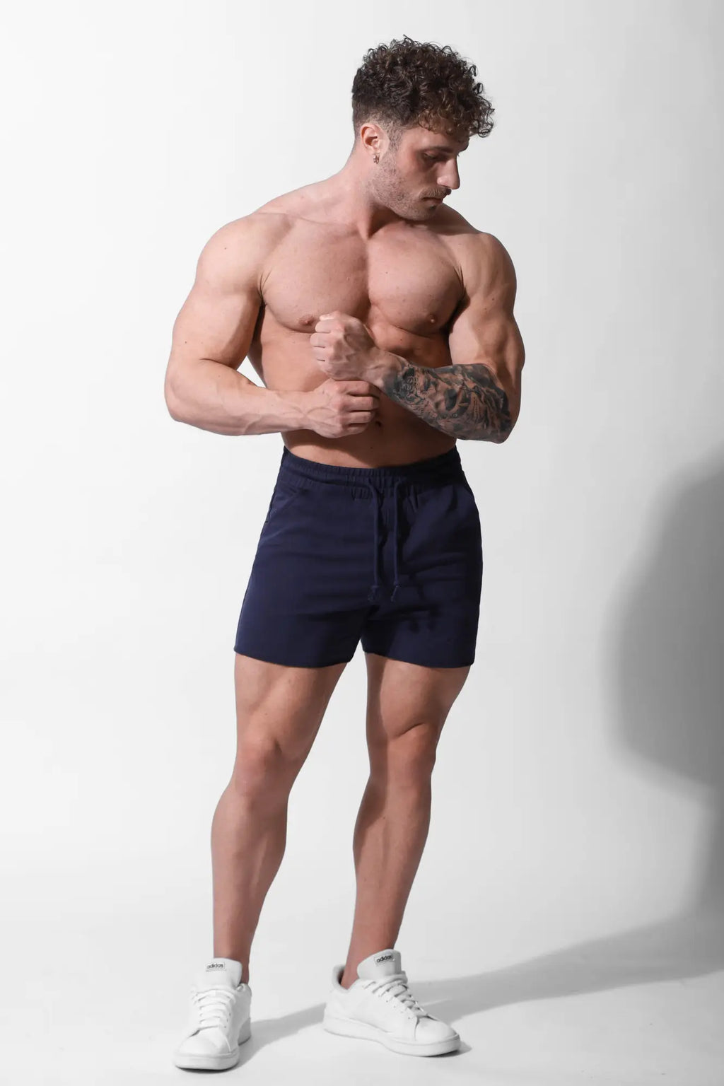 Navy blue jed north motion 5 inch varsity sweat shorts with drawstring waistband for casual athletic wear