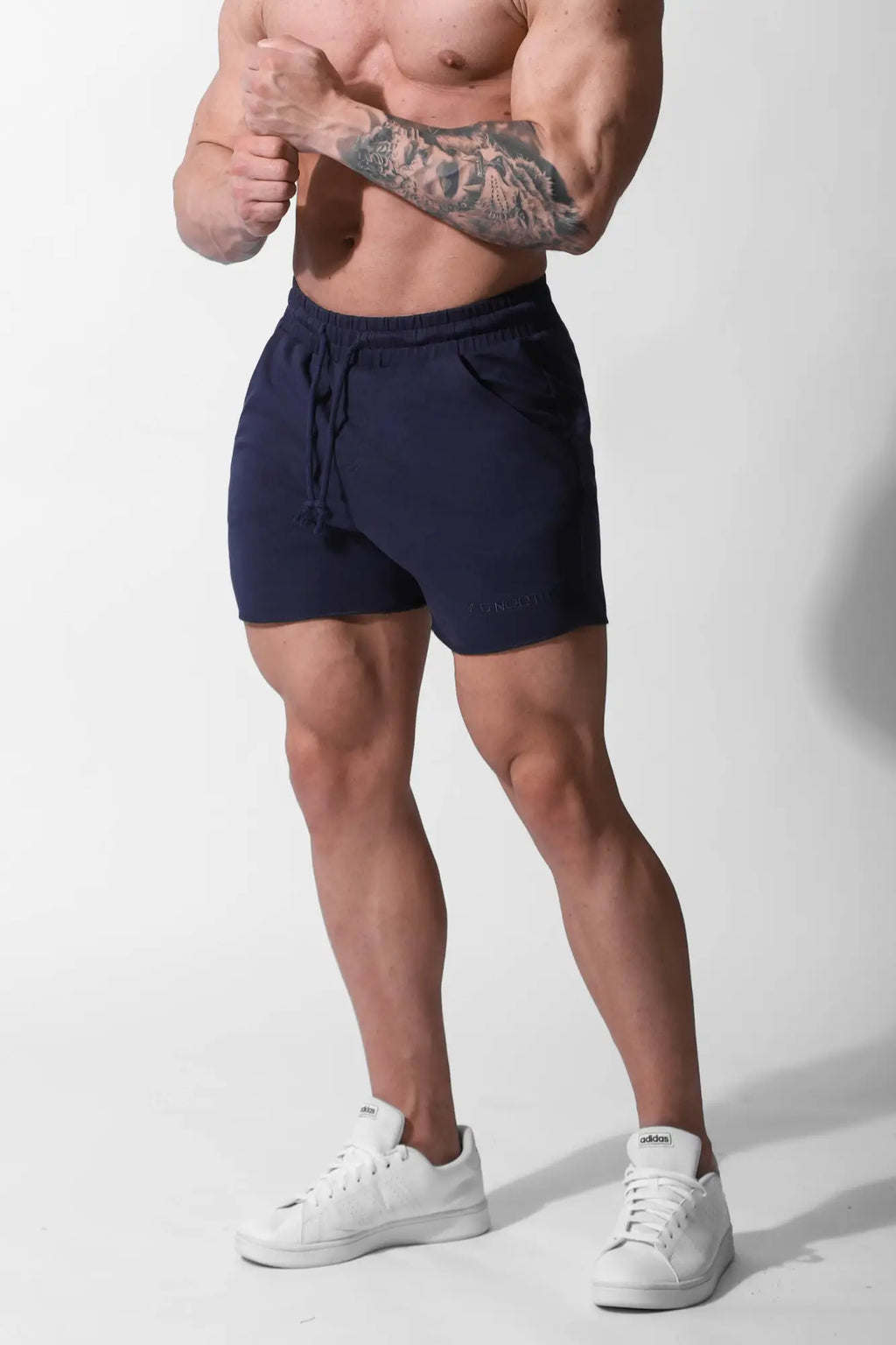 Navy blue Jed North Motion 5 inch varsity sweat shorts with drawstring and soft cotton blend for casual wear