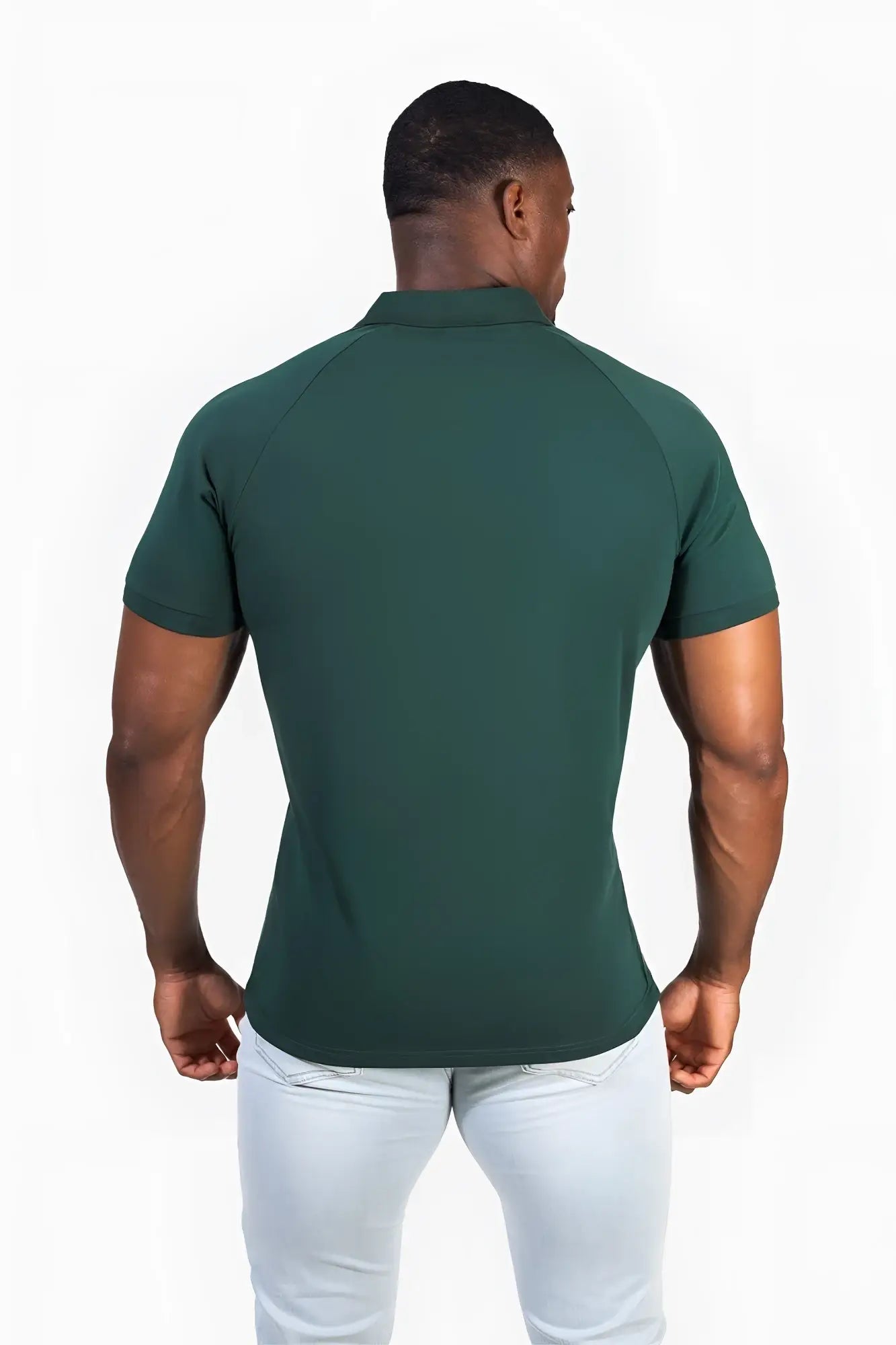 Muscle fit all-day polo t-shirt in evergreen with dark green color, classic collar, and raglan sleeves