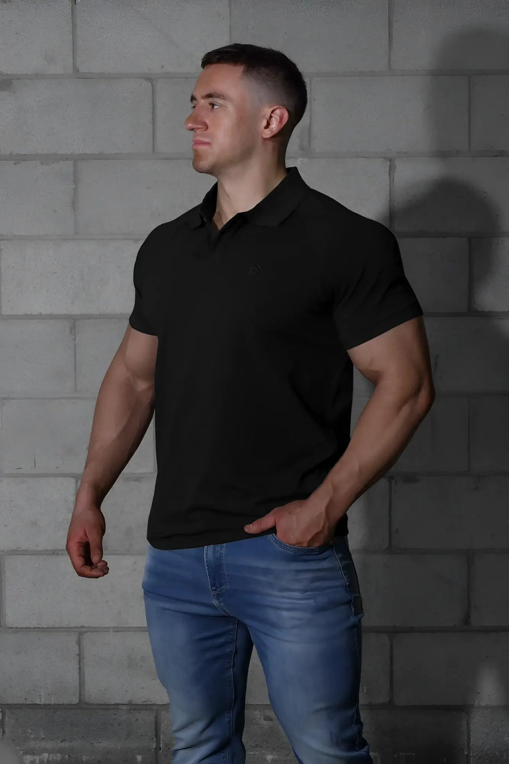 Jed North muscle fit all-day polo t-shirt in onyx black with classic collar and subtle chest logo in black short sleeves