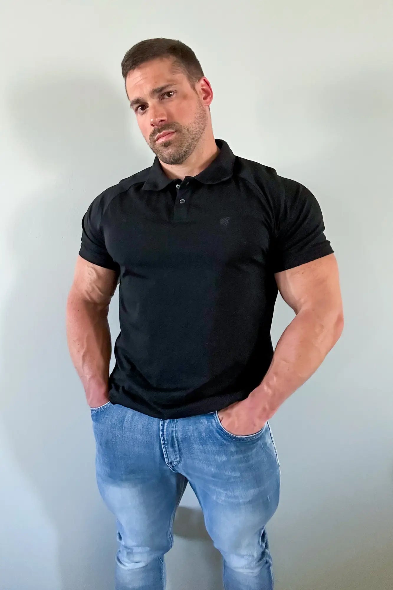 Jed North muscle fit onyx black polo shirt with short sleeves and subtle logo on the left chest