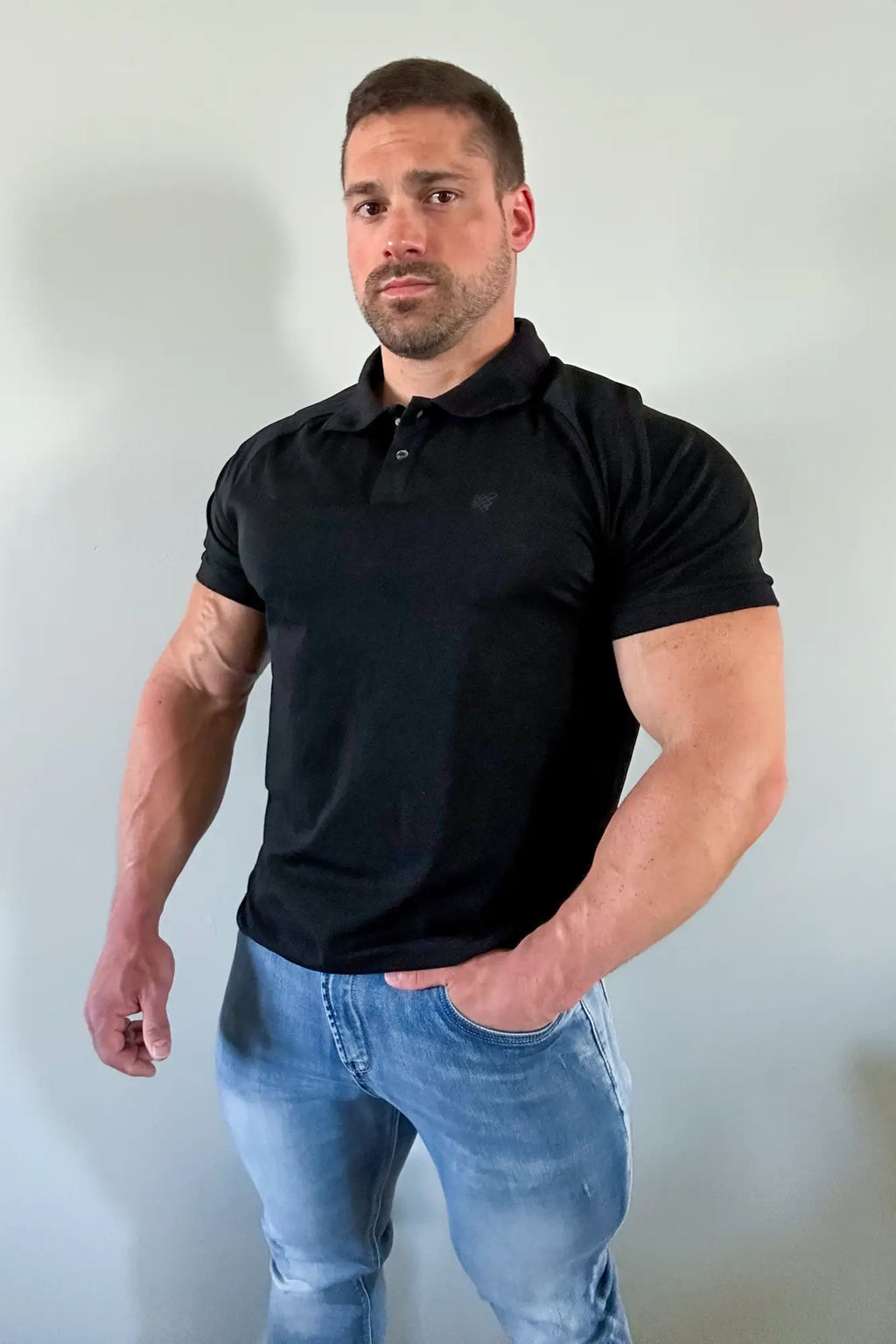 Jed North muscle fit all-day onyx black short-sleeved polo shirt with subtle chest logo for casual wear