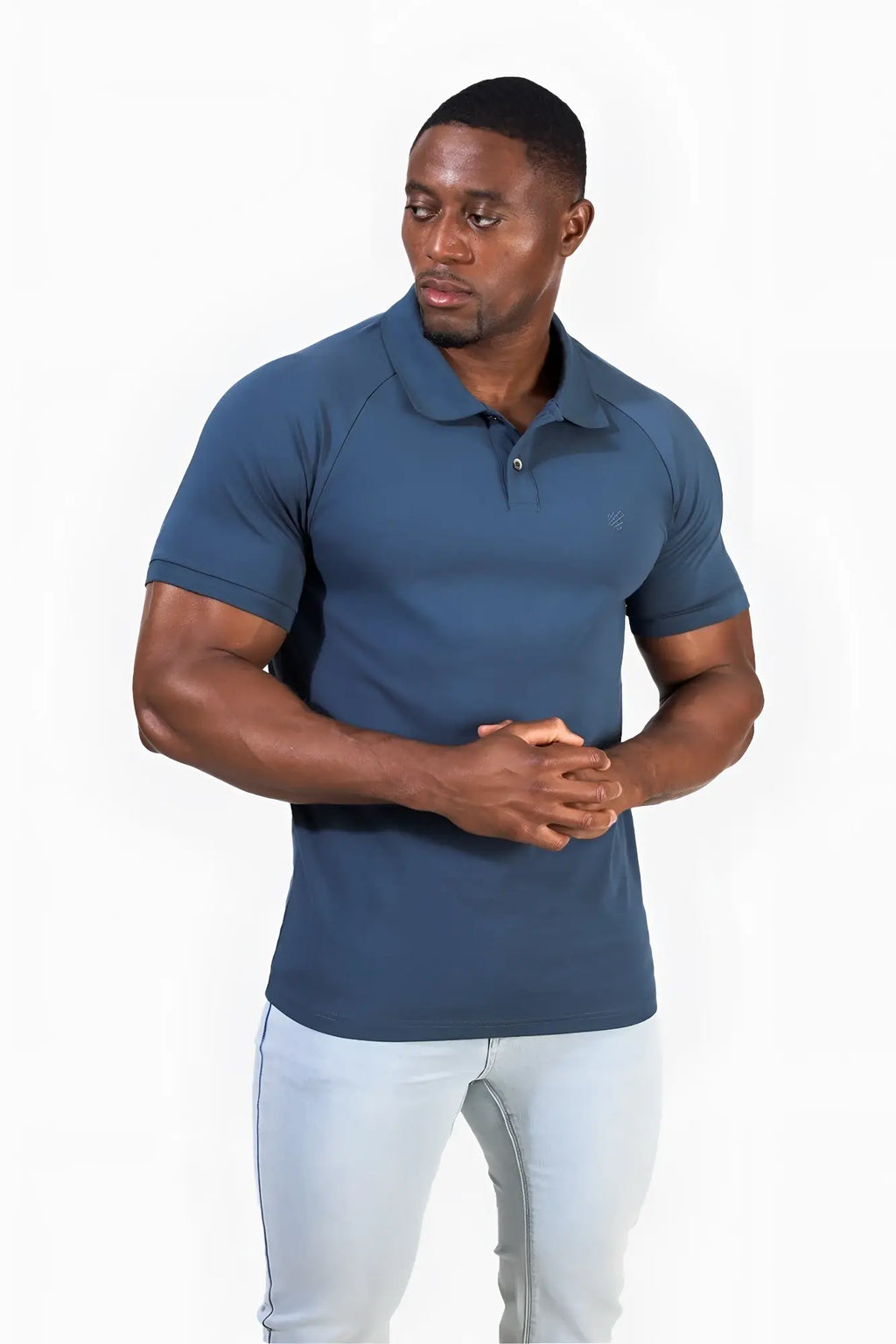 Muscle fit storm blue short-sleeved polo t-shirt with subtle chest logo perfect for all-day comfort