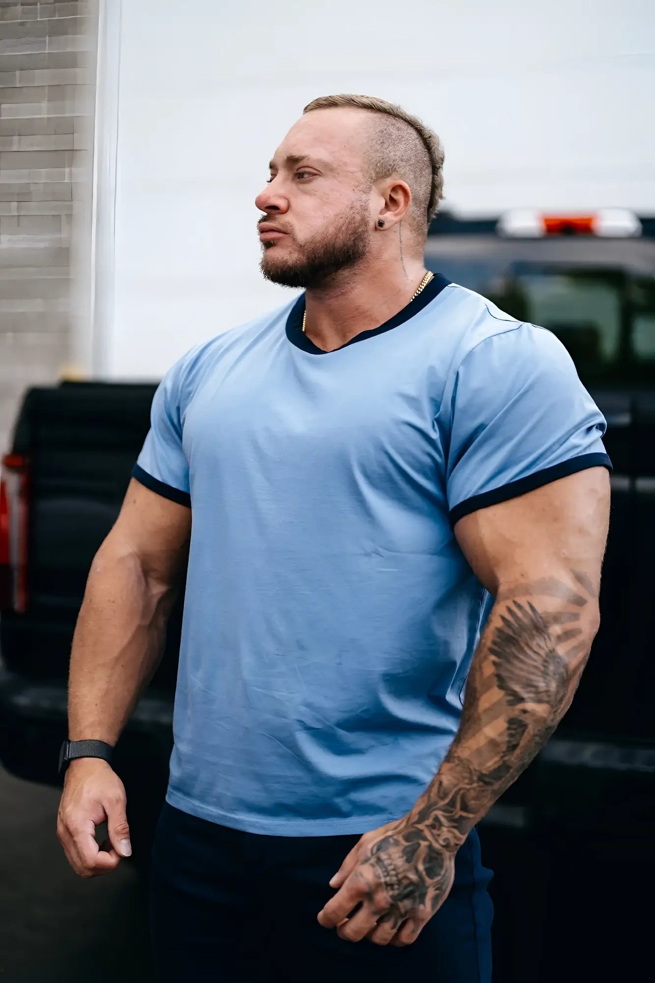 Muscle-fit ringer t-shirt in electric blue with black ribbed trim on collar and sleeves made of soft fabric