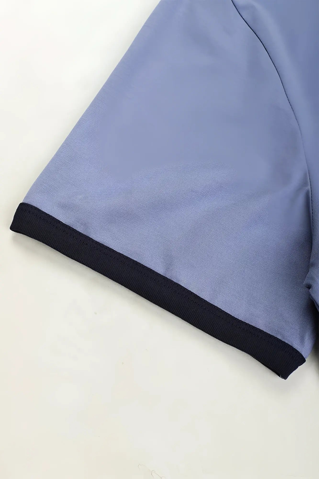 Muscle-fit ringer t-shirt in electric blue with light blue short sleeves and black ribbed trim on sleeve hems