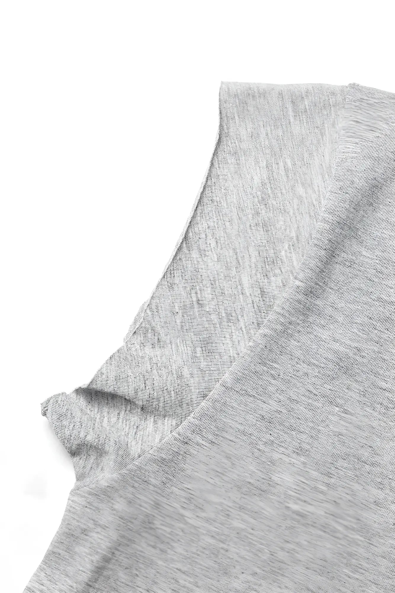 Gray heathered oversized raw-cut cropped tee in soft cotton with a rounded neckline and textured fabric