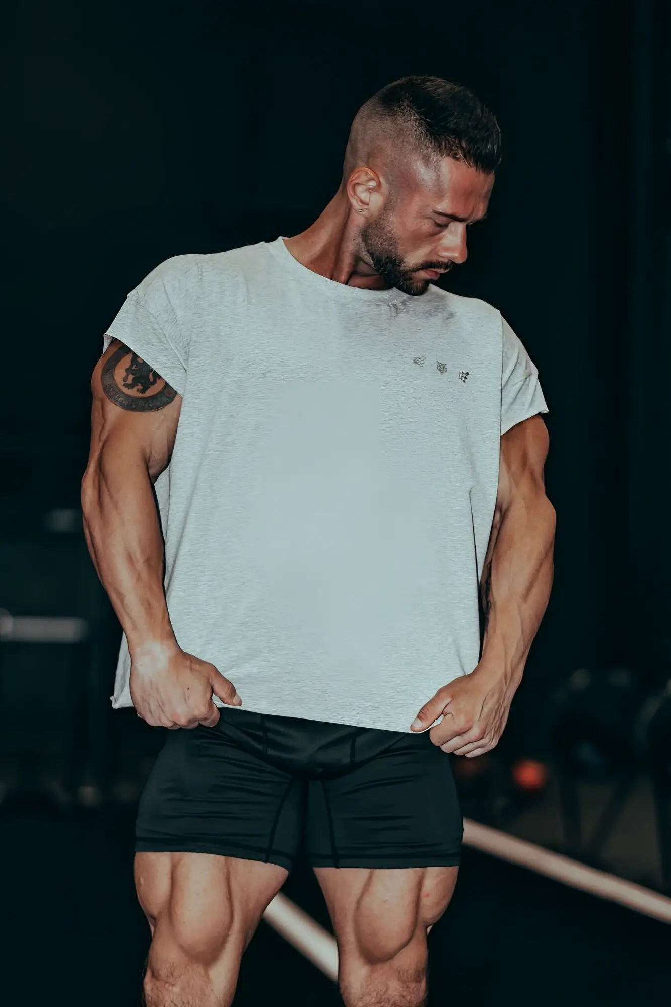 Oversized raw cut cropped tee heather gray short sleeved heather gray with subtle chest logo in soft fabric