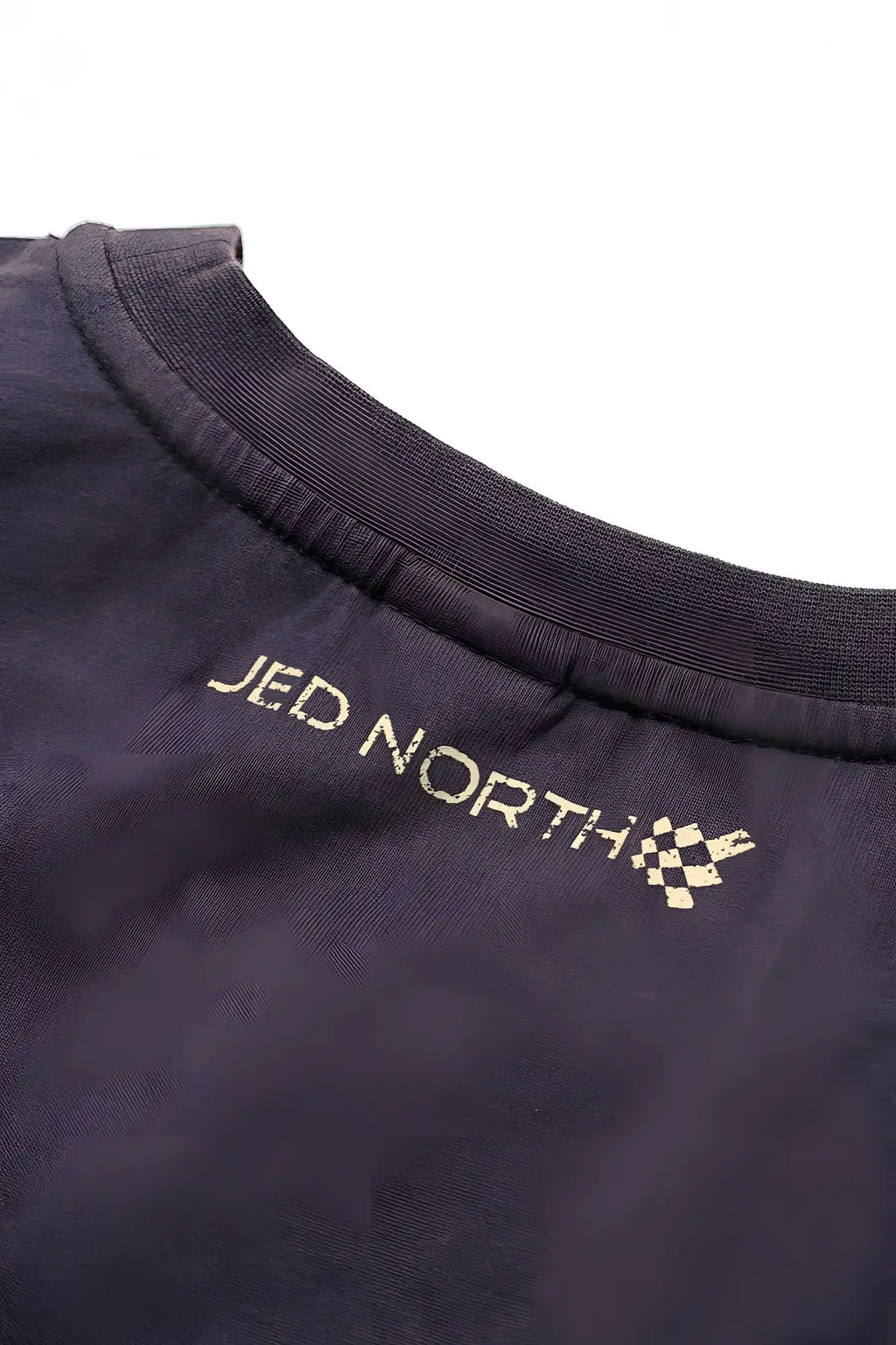 Dark navy oversized washed sleeveless cotton t-shirt with jed north embroidered in gold and checkered flag logo