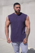 Jed North oversized washed sleeveless t-shirt in dark purple with round neckline and subtle side seam detail