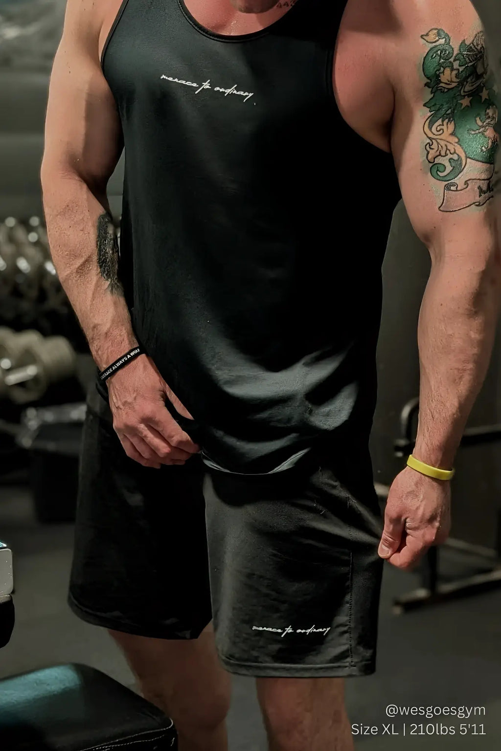 Black jed north performance air-tech sleeveless tank top and athletic shorts with white cursive text design
