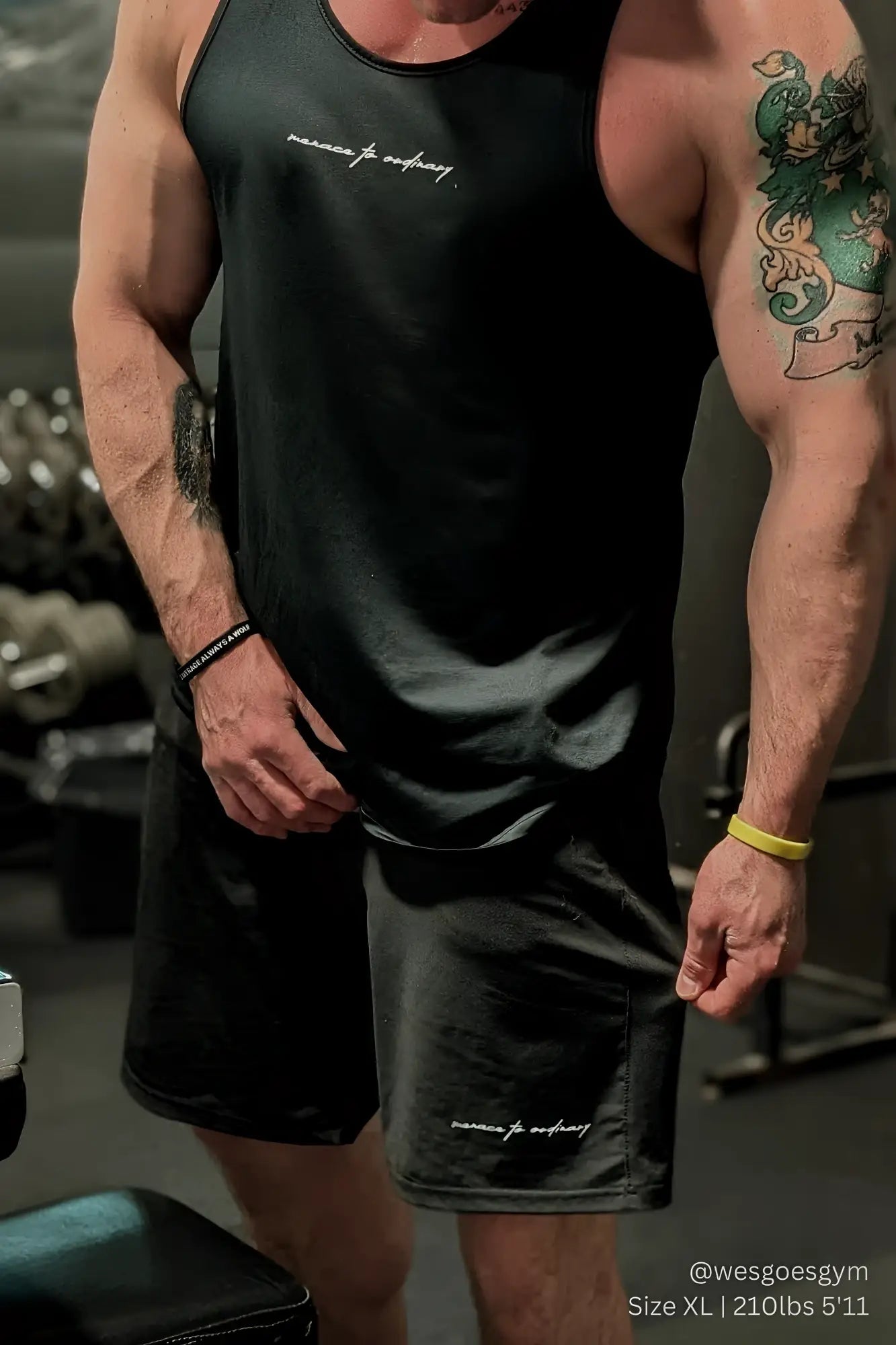 Black jed north performance air-tech sleeveless tank top and athletic shorts with white cursive text design