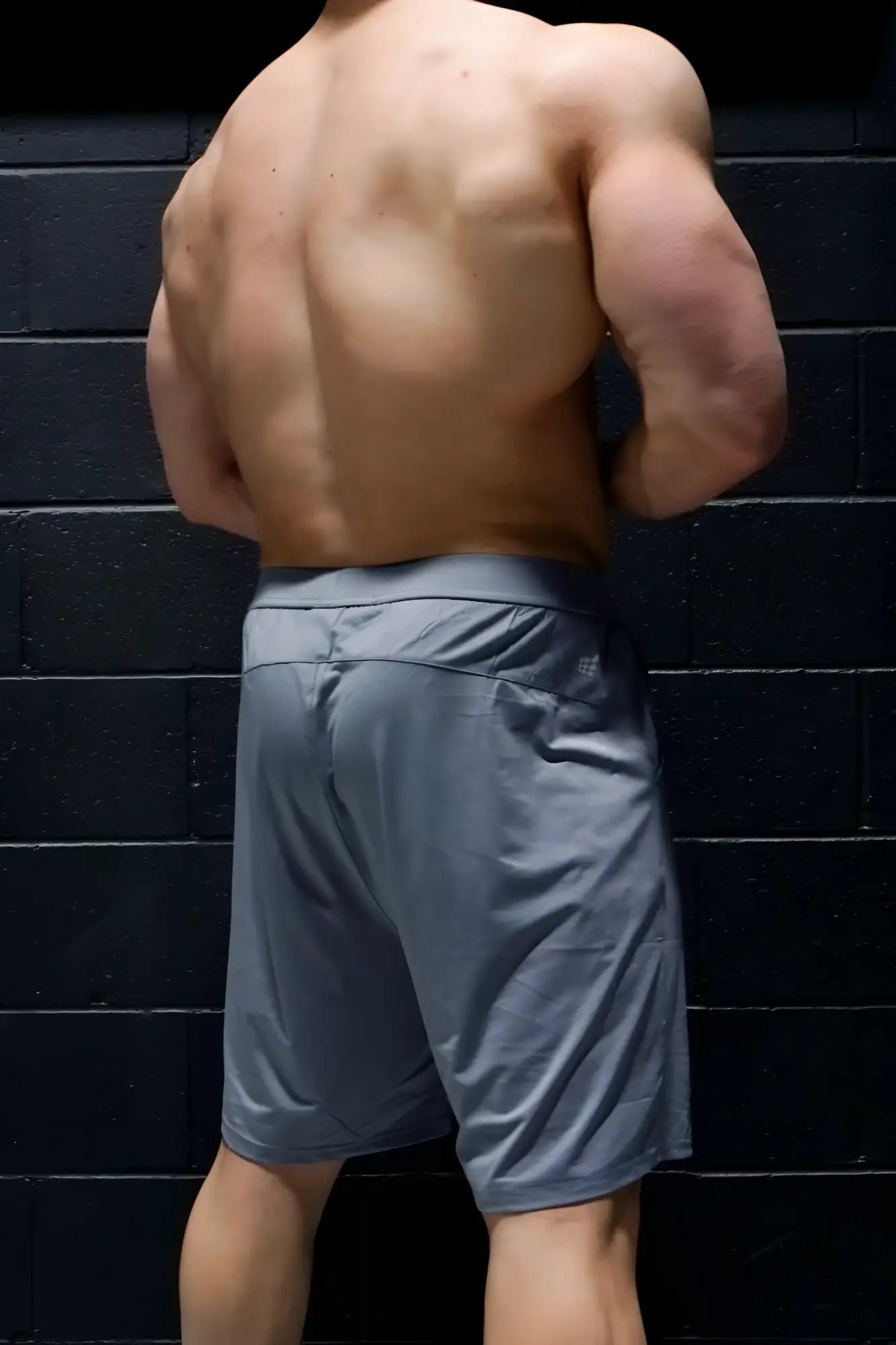 Gray jed north performance air-tech athletic shorts with fitted waistband and subtle side pockets for active use