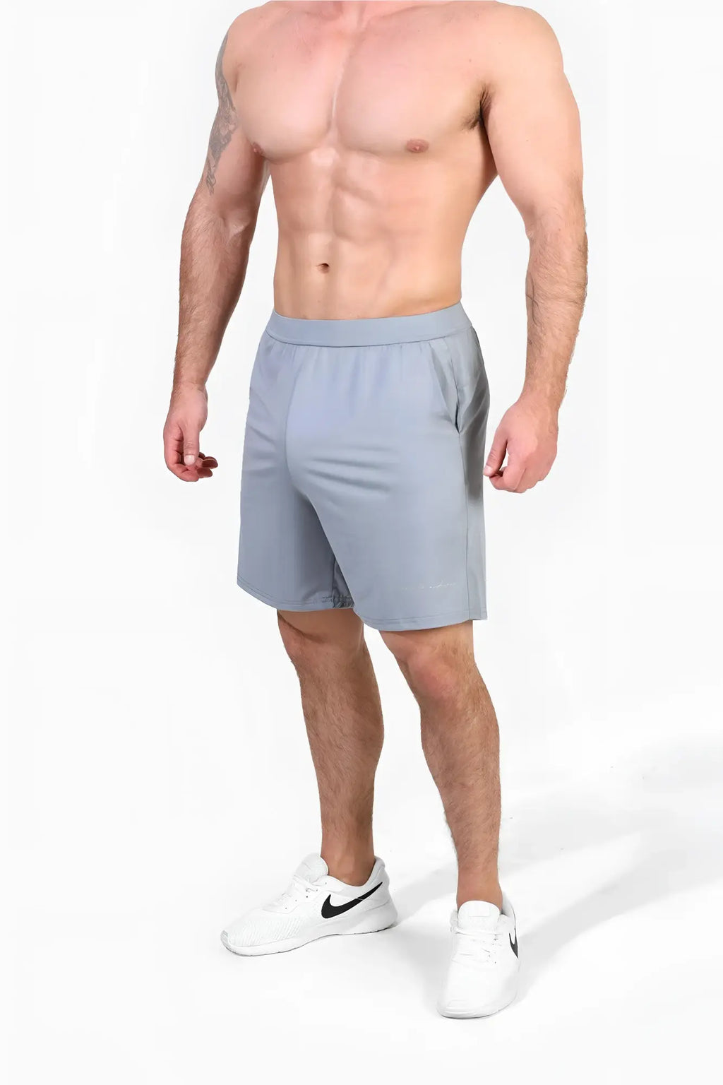 Light gray jed north performance air-tech athletic shorts with sleek modern design and subtle side pockets