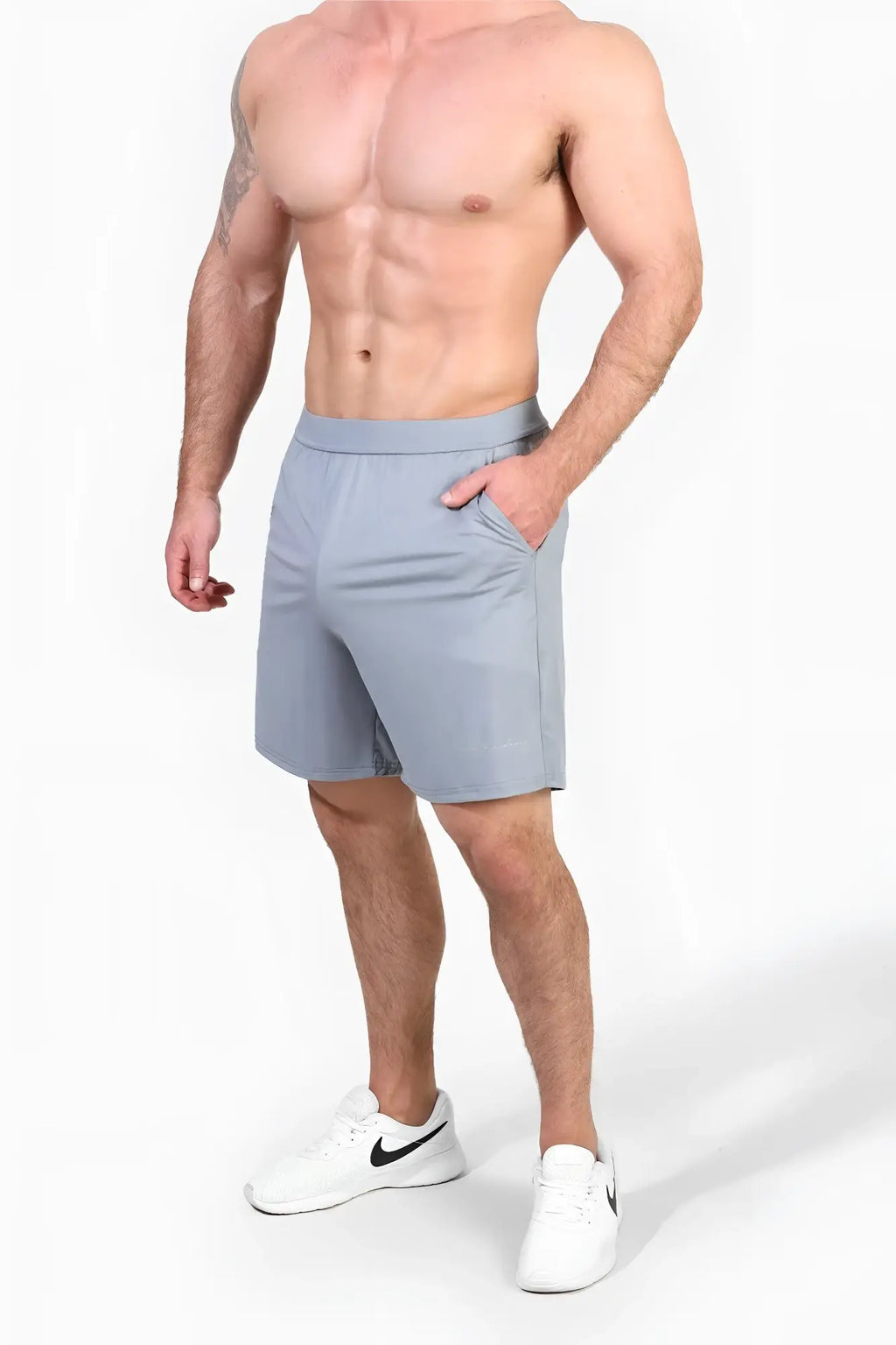 Light gray Jed North performance air-tech athletic shorts with sleek modern design and side pockets for training
