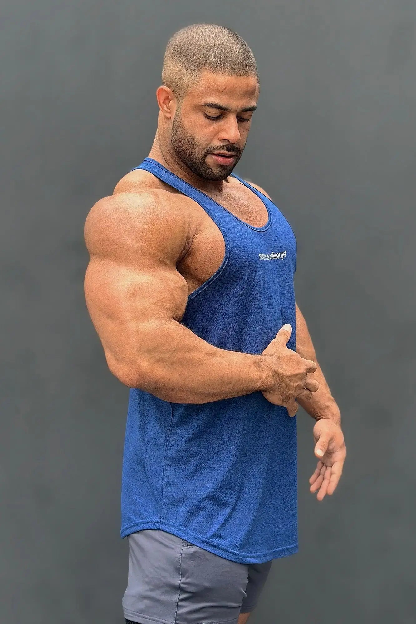 Jed north performance max bodybuilding stringer tank top in denim blue with textured weave and white logo on chest